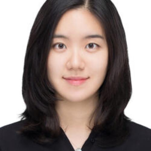 A young asian woman in a black shirt.